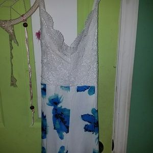 A white lace with floral bottom romper